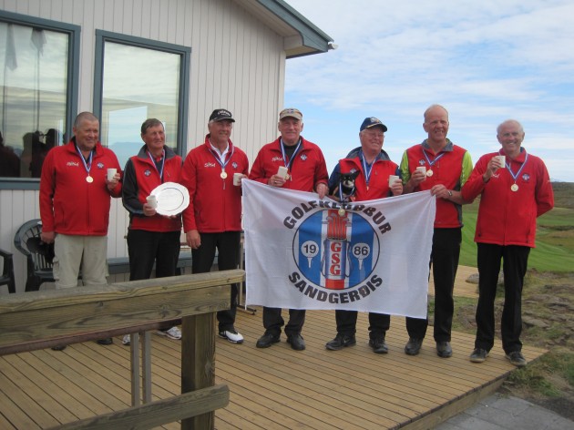 The Men´s team of Sandgerði who won their matches in the 2nd division and will play in the 1st division this year, 2013. Sandgerði´s little golfdog, Erró, is in the middle with a goldmedal around his neck!!!