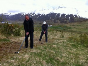 Standing in front: Ingvar Hreinsson, foreman of GKS and behind him Ólafur Kárason - taking the first strokes on the new golfcourse in Siglufjörður to be. 